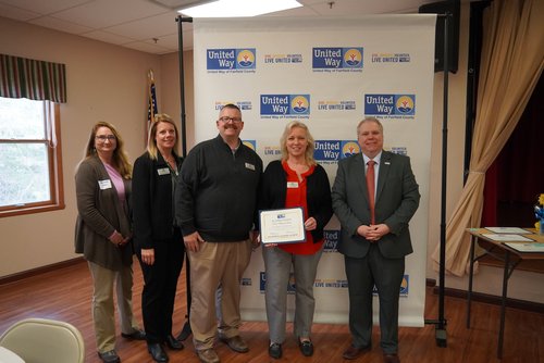 Park National Bank accepts the Per Capita Giving award